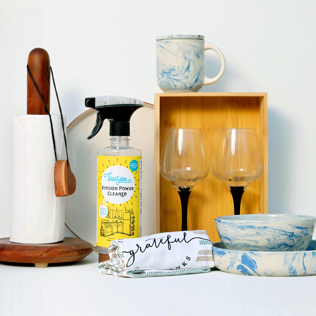 WashSalon Kitchen Cleaner Spray bottle placed on a kitchen counter for heavy-duty degreasing in Indian kitchens